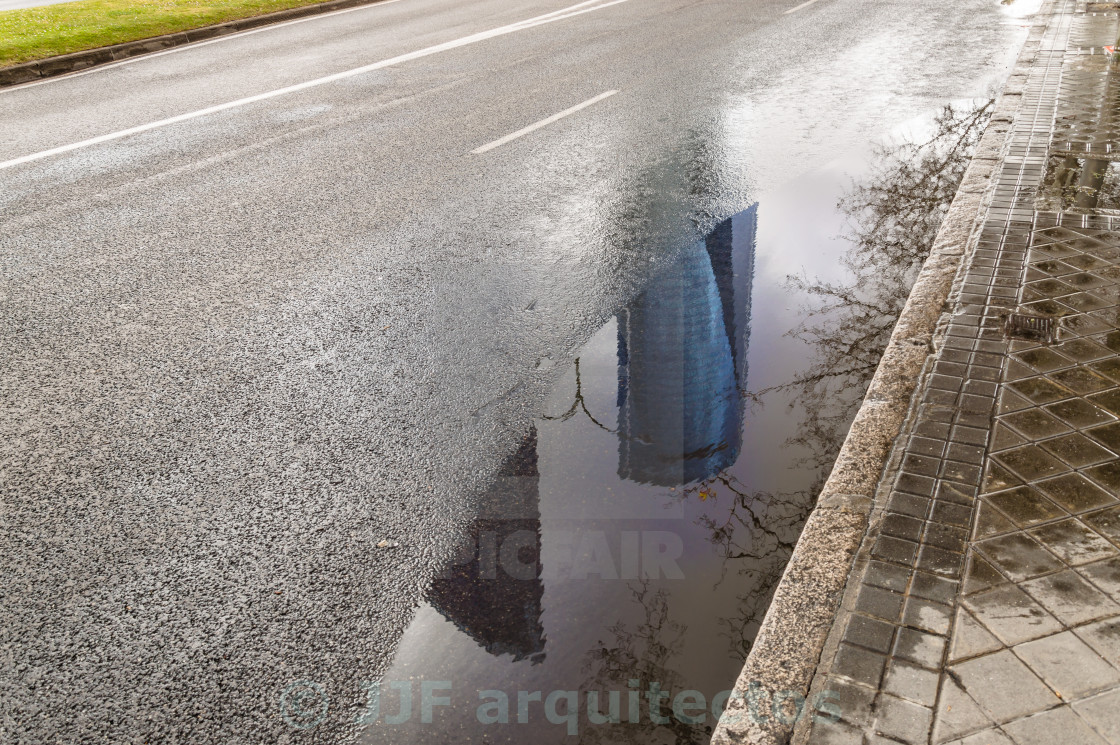 "Architecture reflections on the puddle" stock image