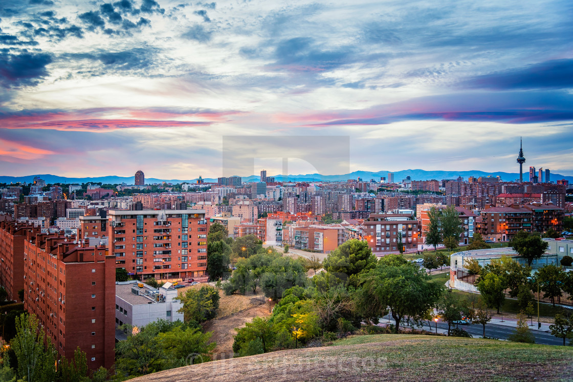 "Madrid cityscape at sunset with purple clouds" stock image