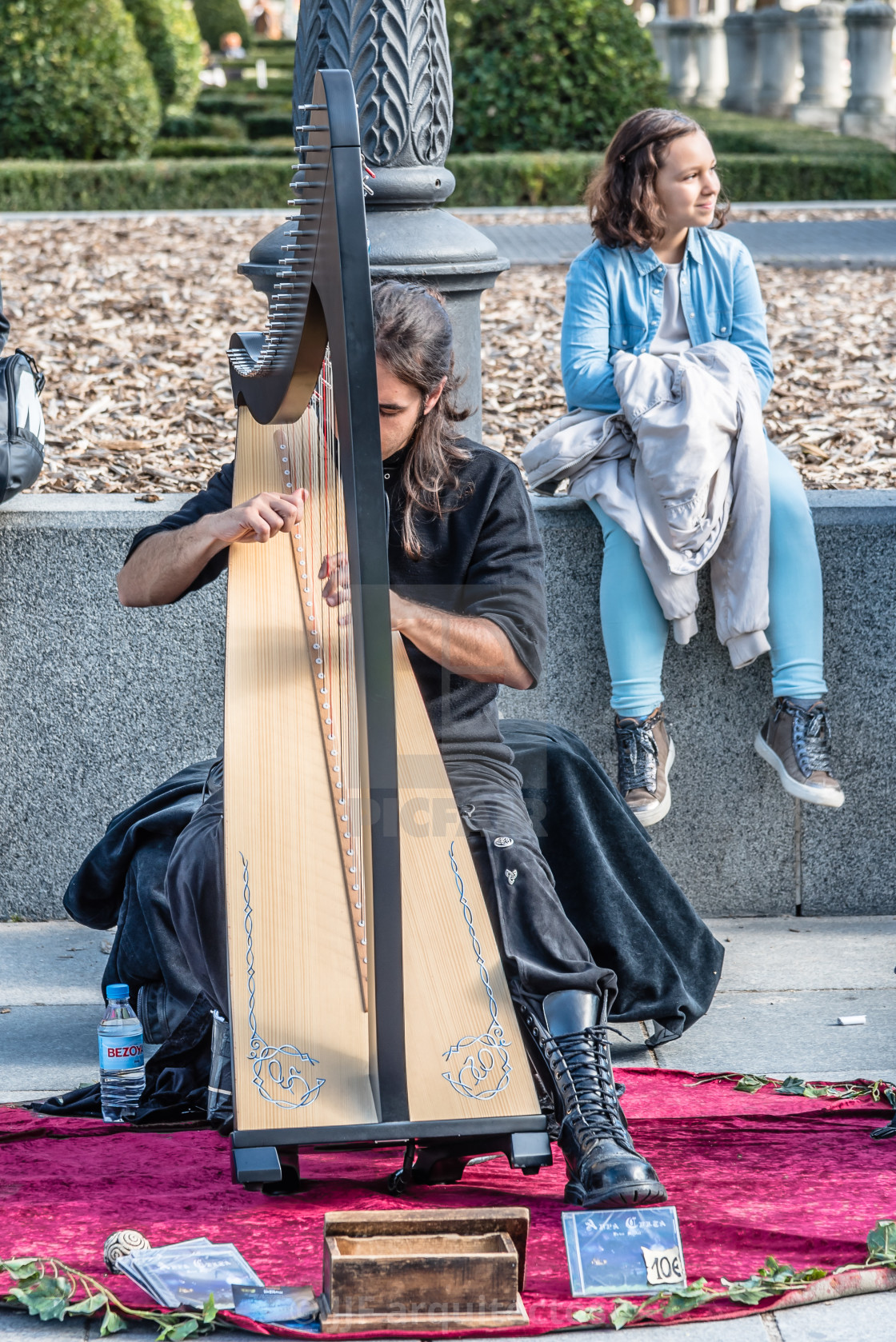 "Street musician playing the harp" stock image