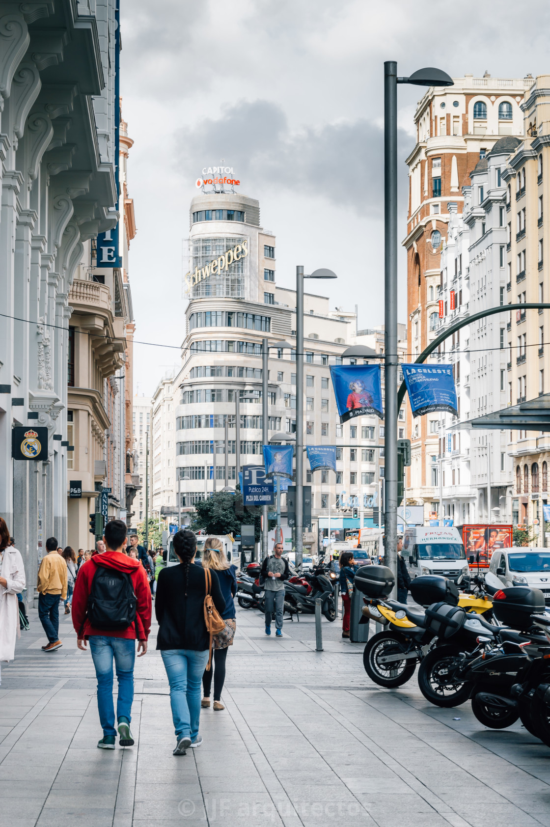 "People walking in a commercial street" stock image