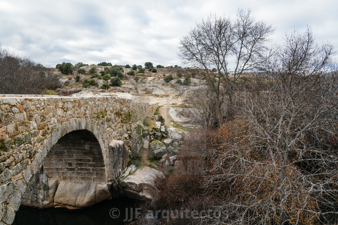 "Medieval bridge at Colmenar, Spain" stock image