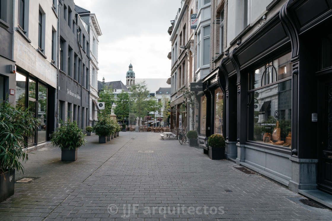 "Commercial street in Antwerp at sunset with no people" stock image