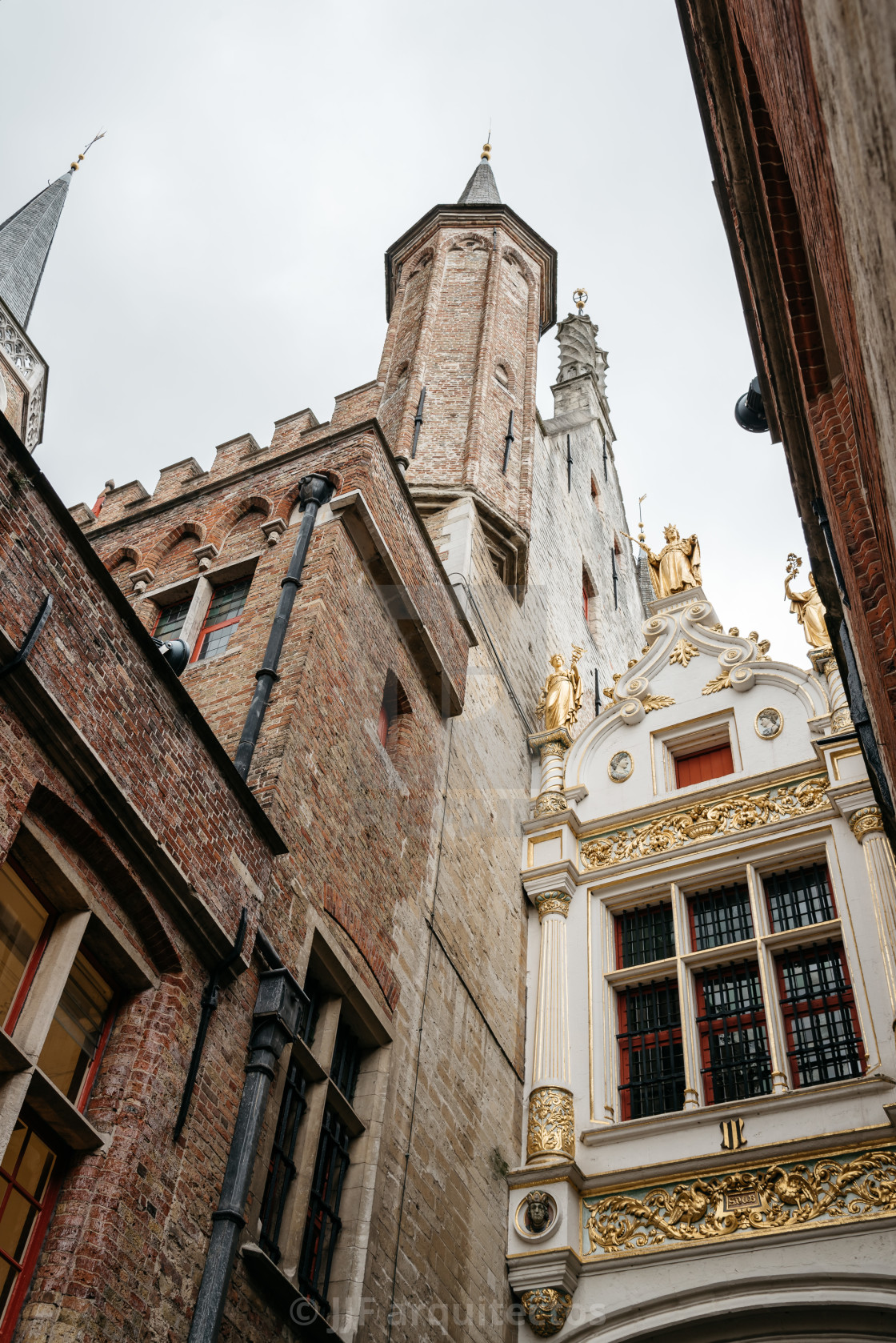 "Low angle view of Town Hall Tower of Bruges" stock image