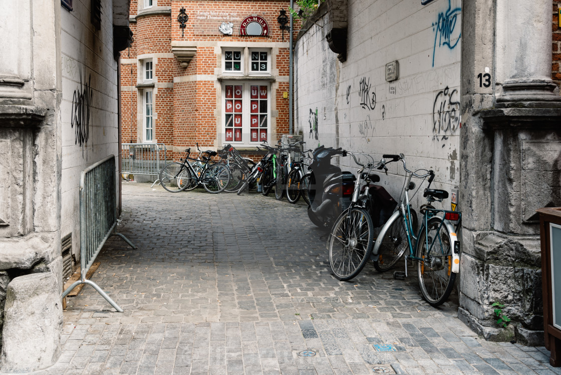 "Alley with bicycles parked in historical centre of Leuven" stock image