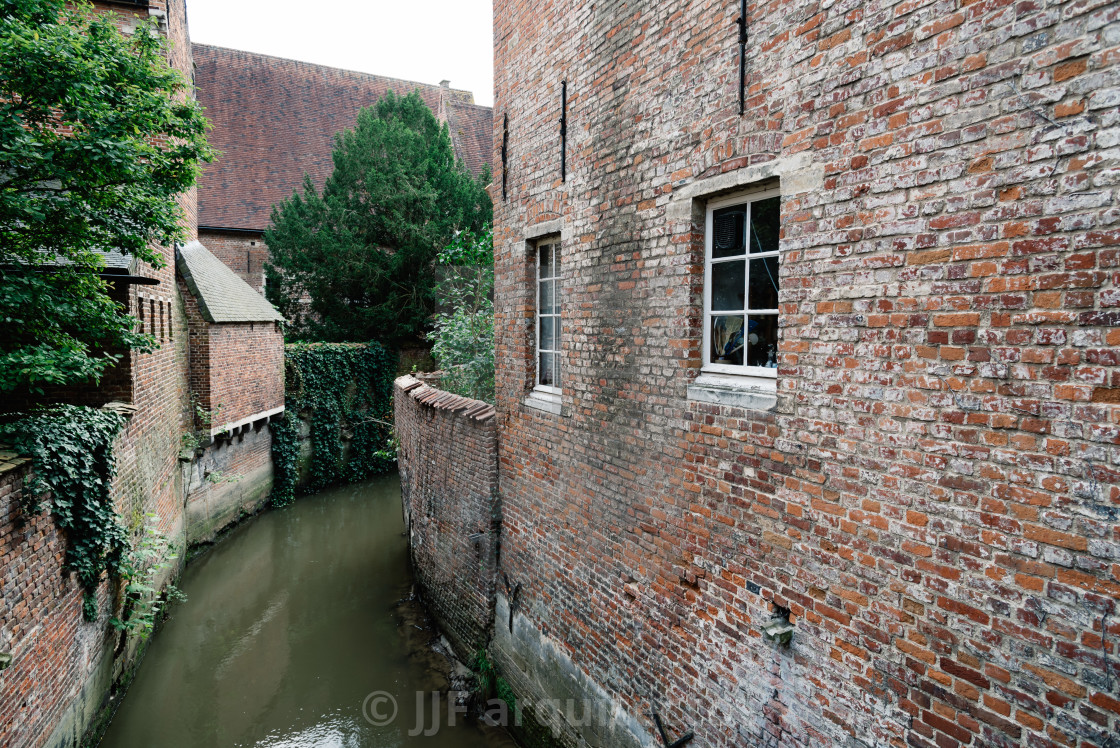 "Canal in medieval Beguinage of Leuven" stock image