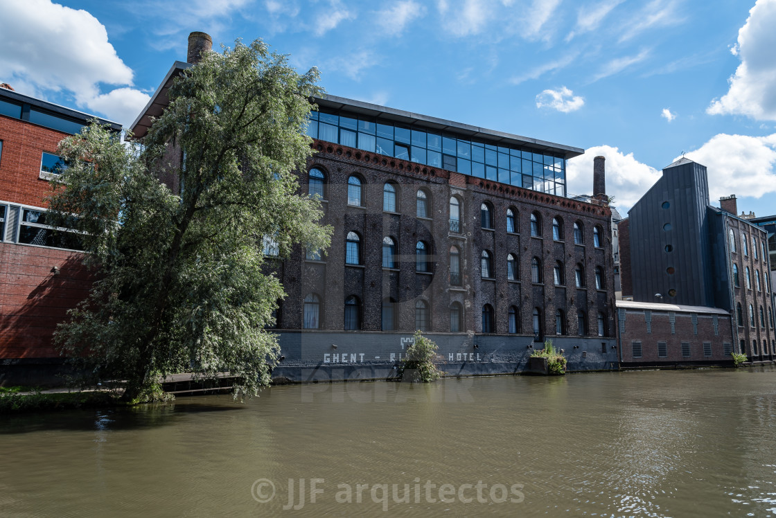 "Canal in the historic center of Ghent with picturesque old build" stock image