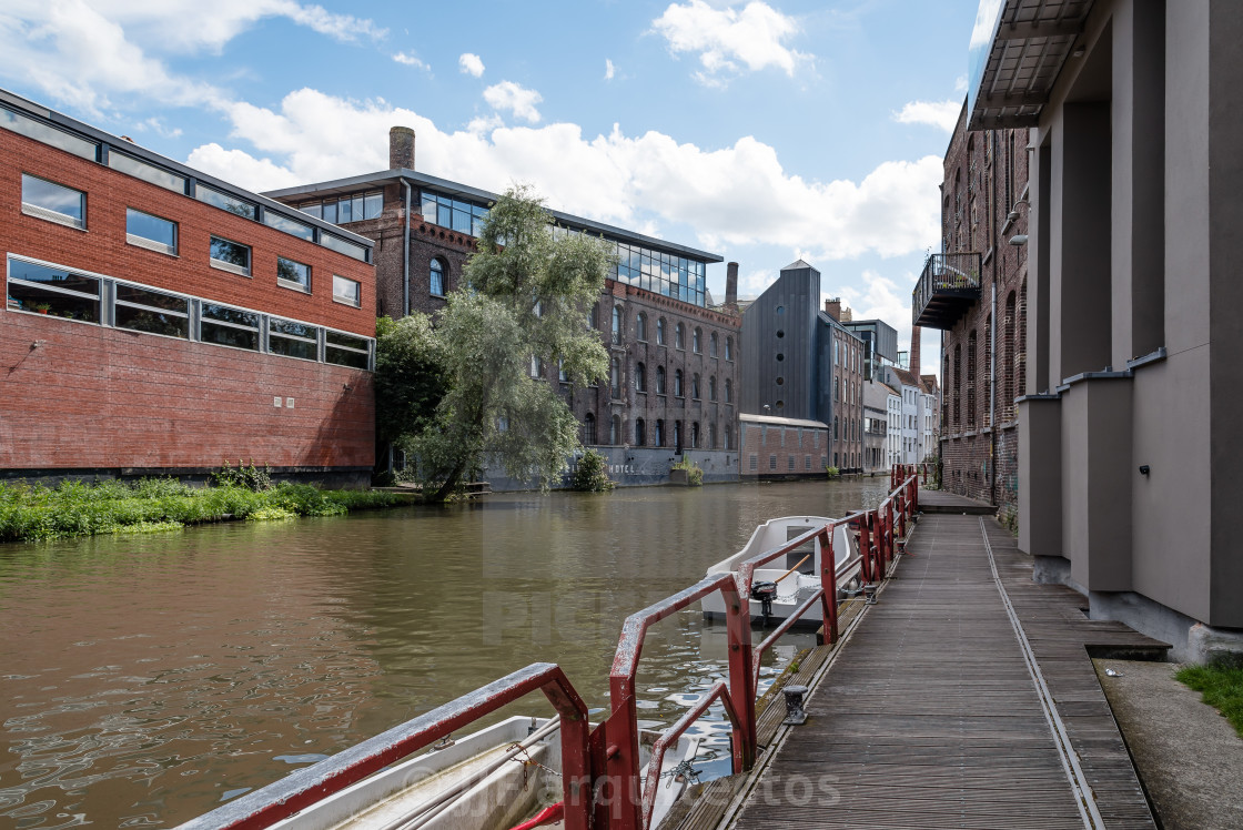 "Canal in the historic center of Ghent with picturesque old build" stock image