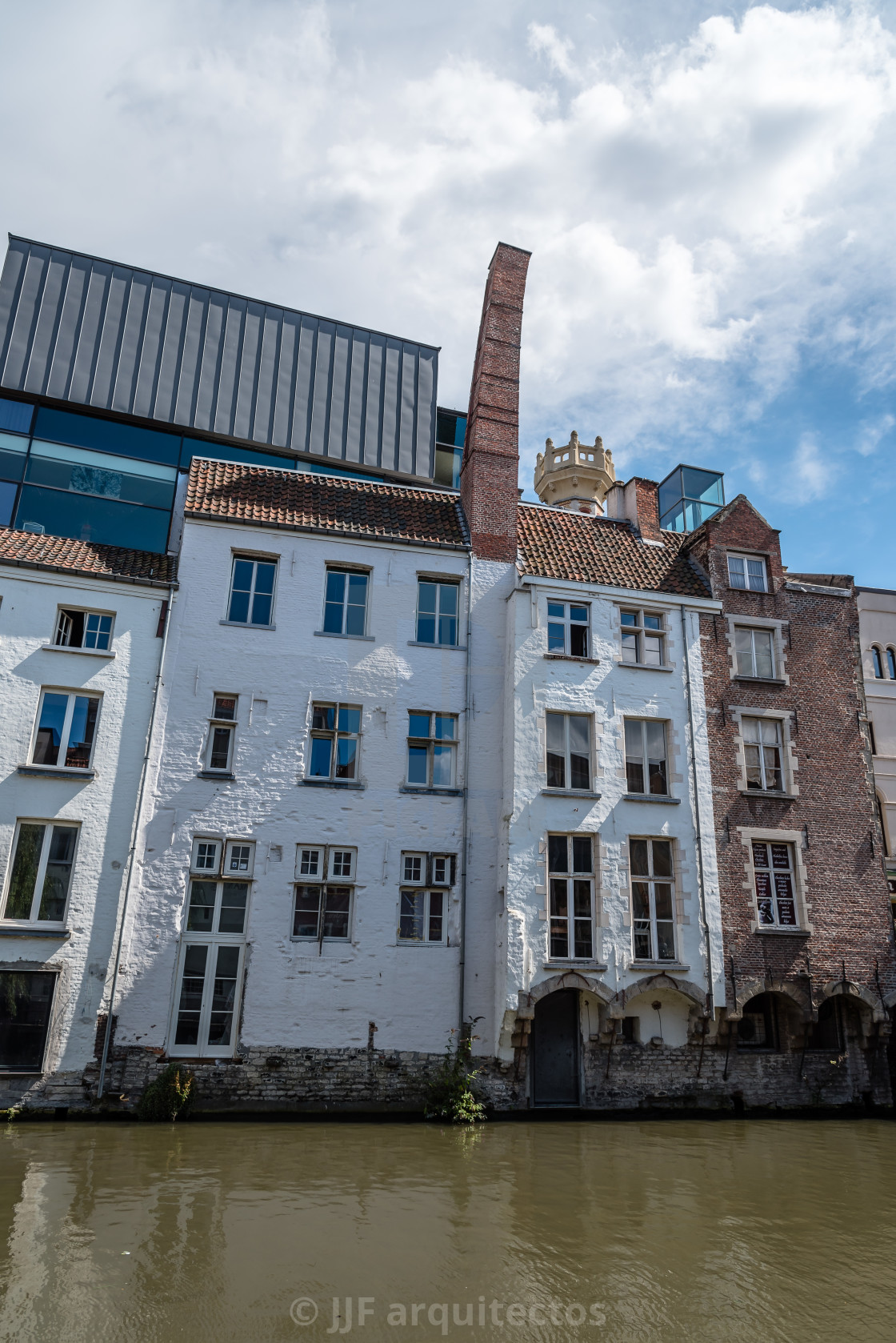 "Canal in the historic center of Ghent with picturesque old build" stock image