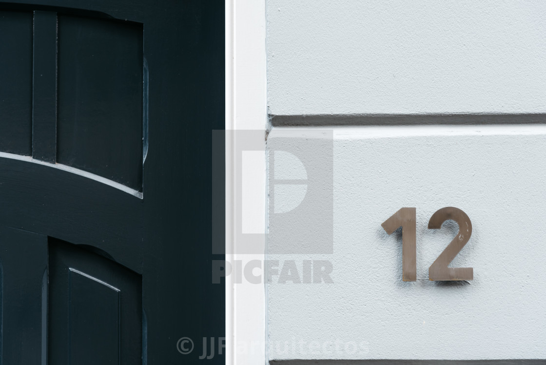 "Classic green door with number 12. Vintage style" stock image