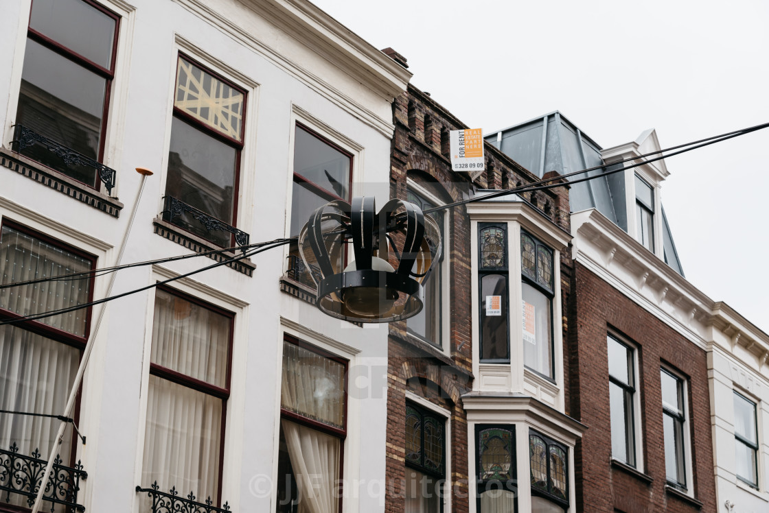 "Low angle street view of old buildings in The Hague" stock image