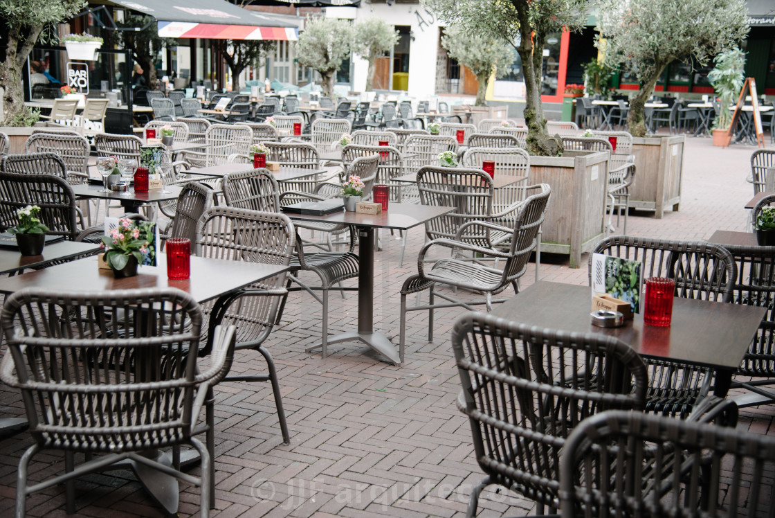 "Empty sidewalk cafe in a square in the city of Arnhem in summer" stock image