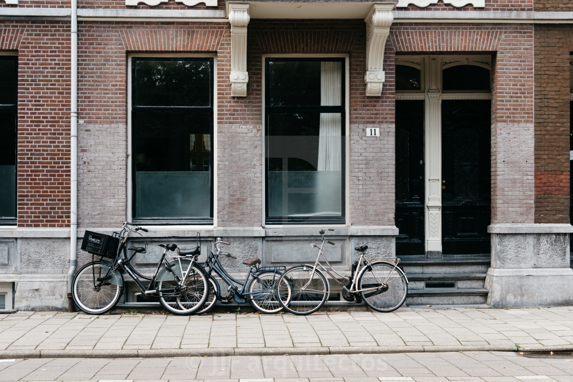 "Bicycles and typical houses in Oude Pijp" stock image