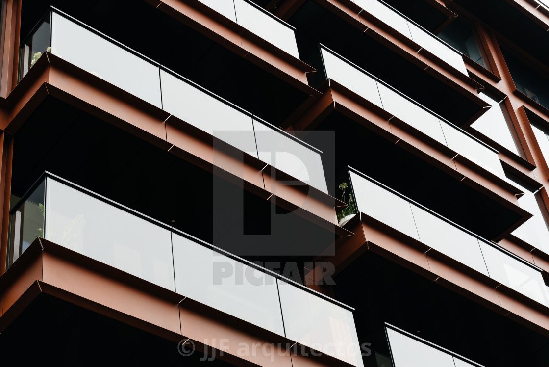 "Detail of steel facade with balconies in modern apartment buildi" stock image