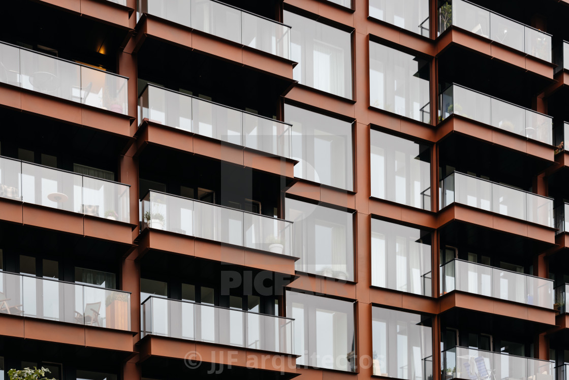 "Detail of steel facade with balconies in modern apartment buildi" stock image