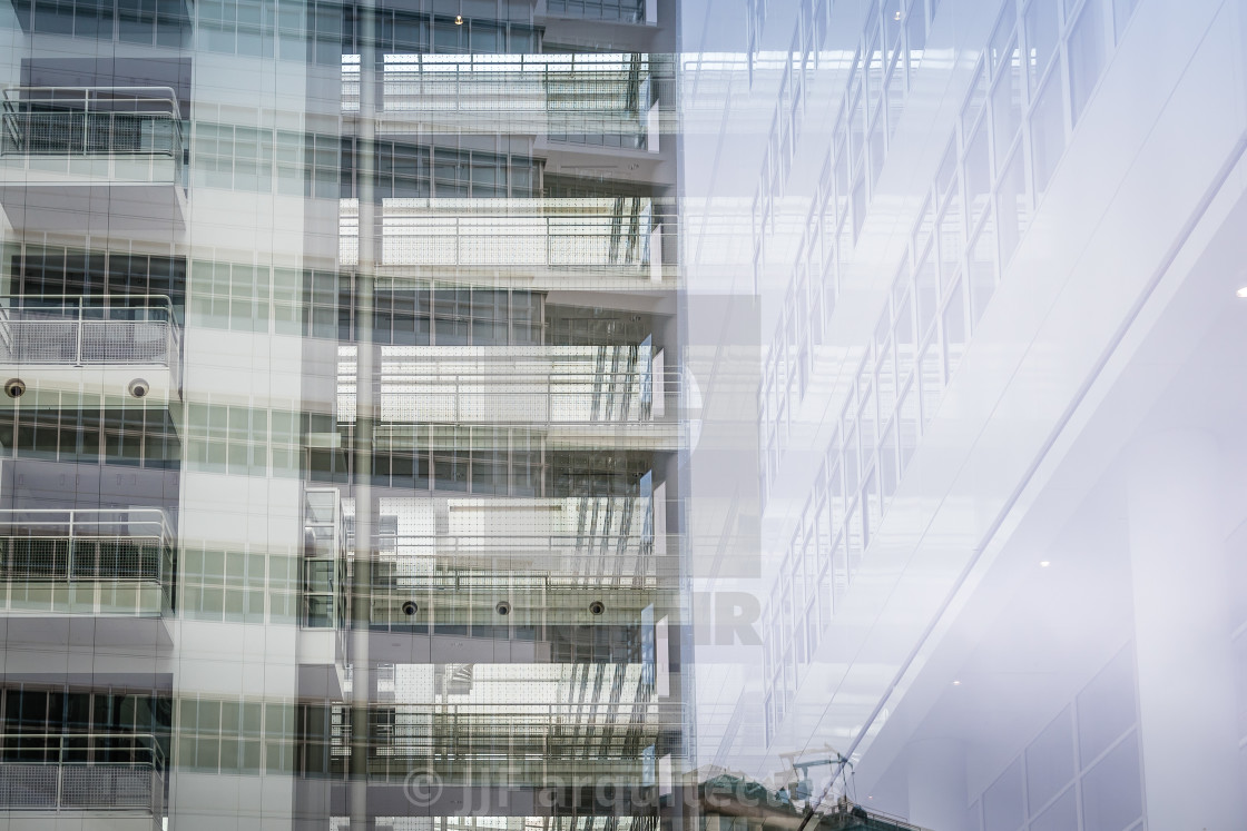 "Reflections on abstract curtain wall in modern office building" stock image