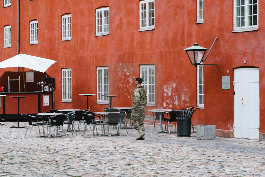 "A soldier in the Kastellet a cloudy day of summer. It is one of" stock image