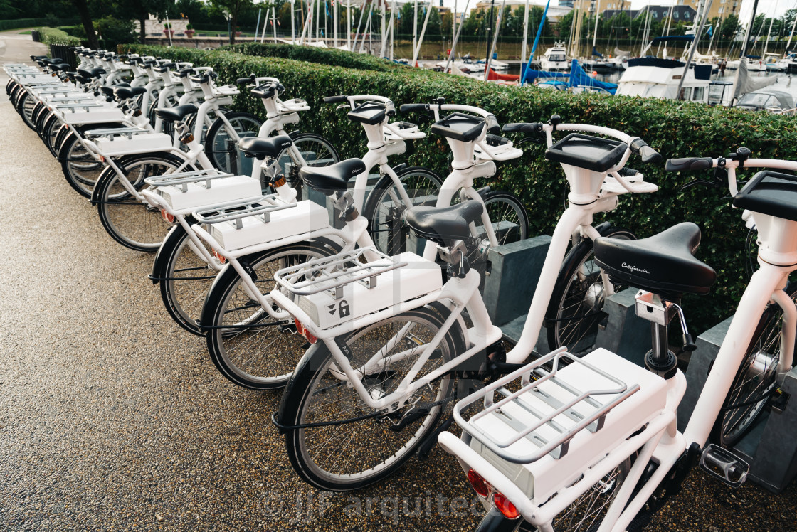 "Row of white rental Go-bikes, which can be hired per hour. Selec" stock image