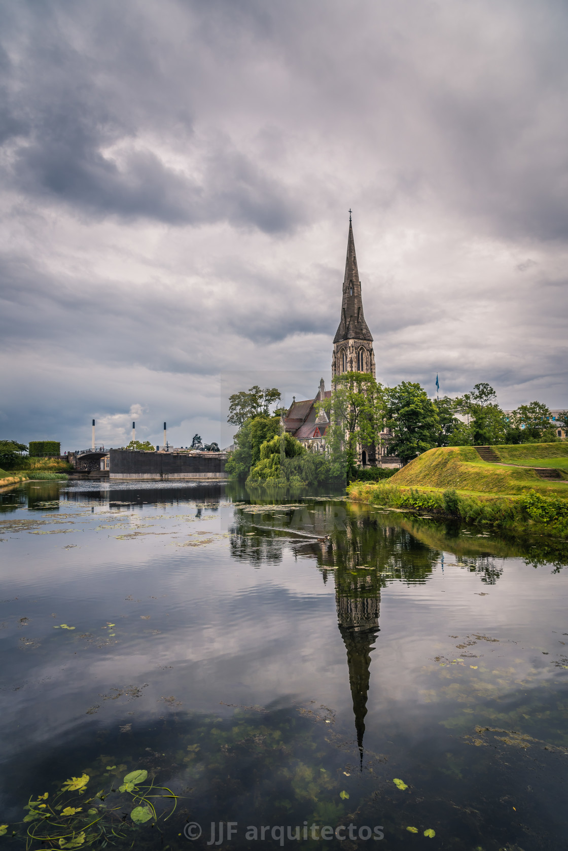 "Church reflected on water pond in Churchill Park in Copenhagen a" stock image