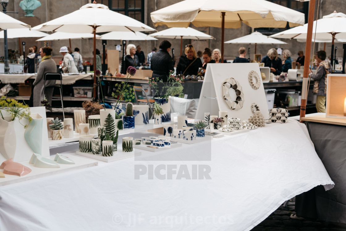 "People in antiques and artisans street market in Frue Square in" stock image