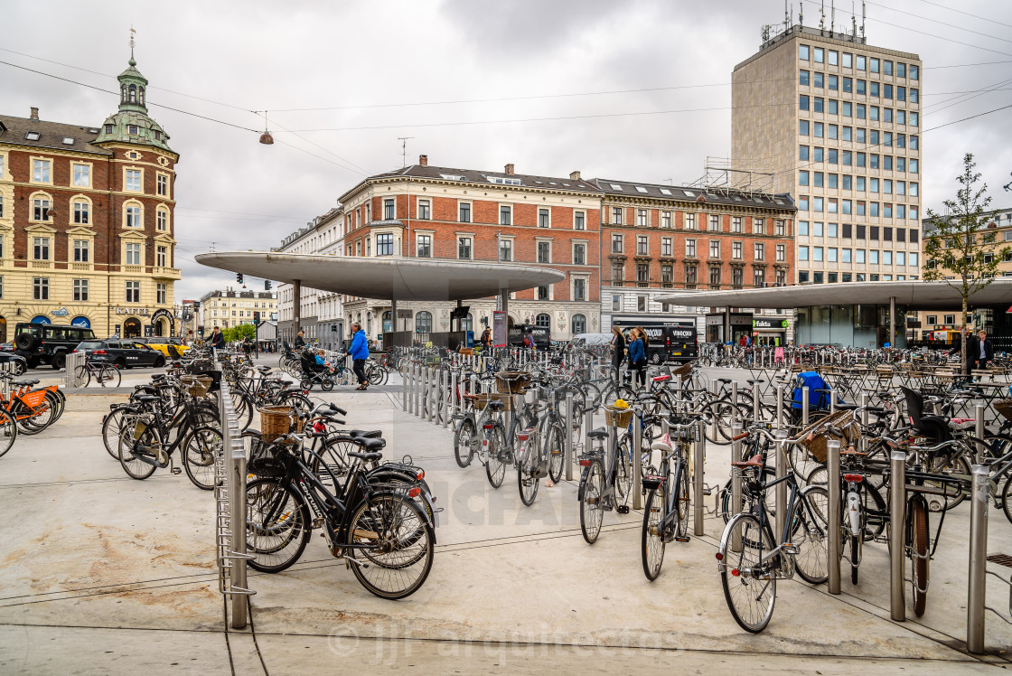 "Bicycle parking near railway station a cloudy day of summer" stock image