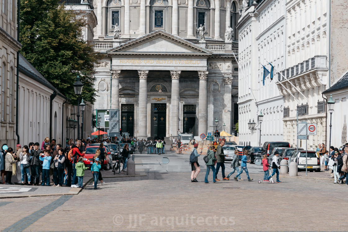 "A crowd of tourists in waiting the changing guard in Amalienborg" stock image