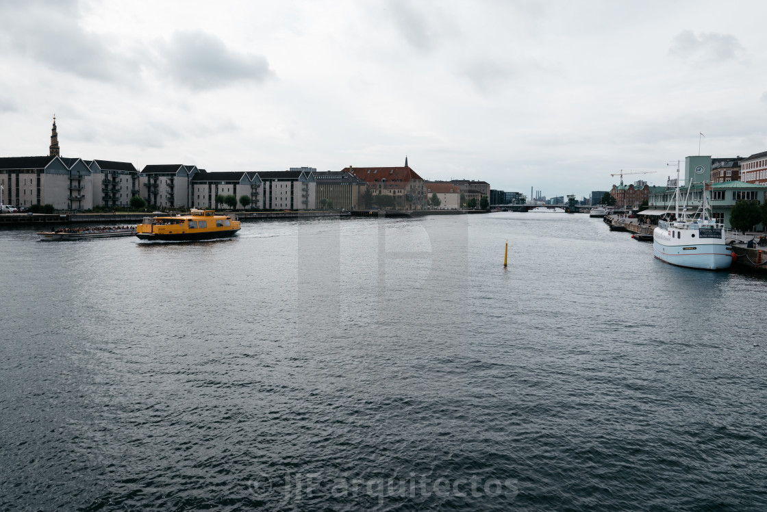 "Waterfront of Copenhagen with nautical vessel on the water a cl" stock image