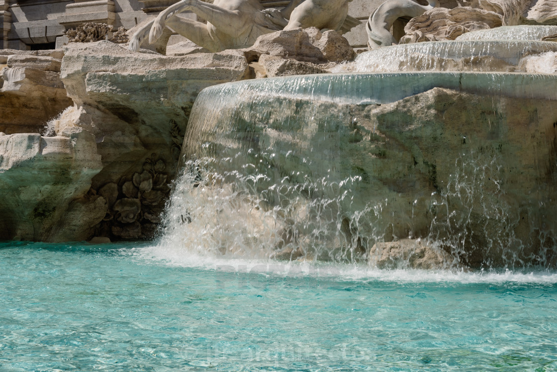 "Trevi fountain in Rome. Water splashing" stock image