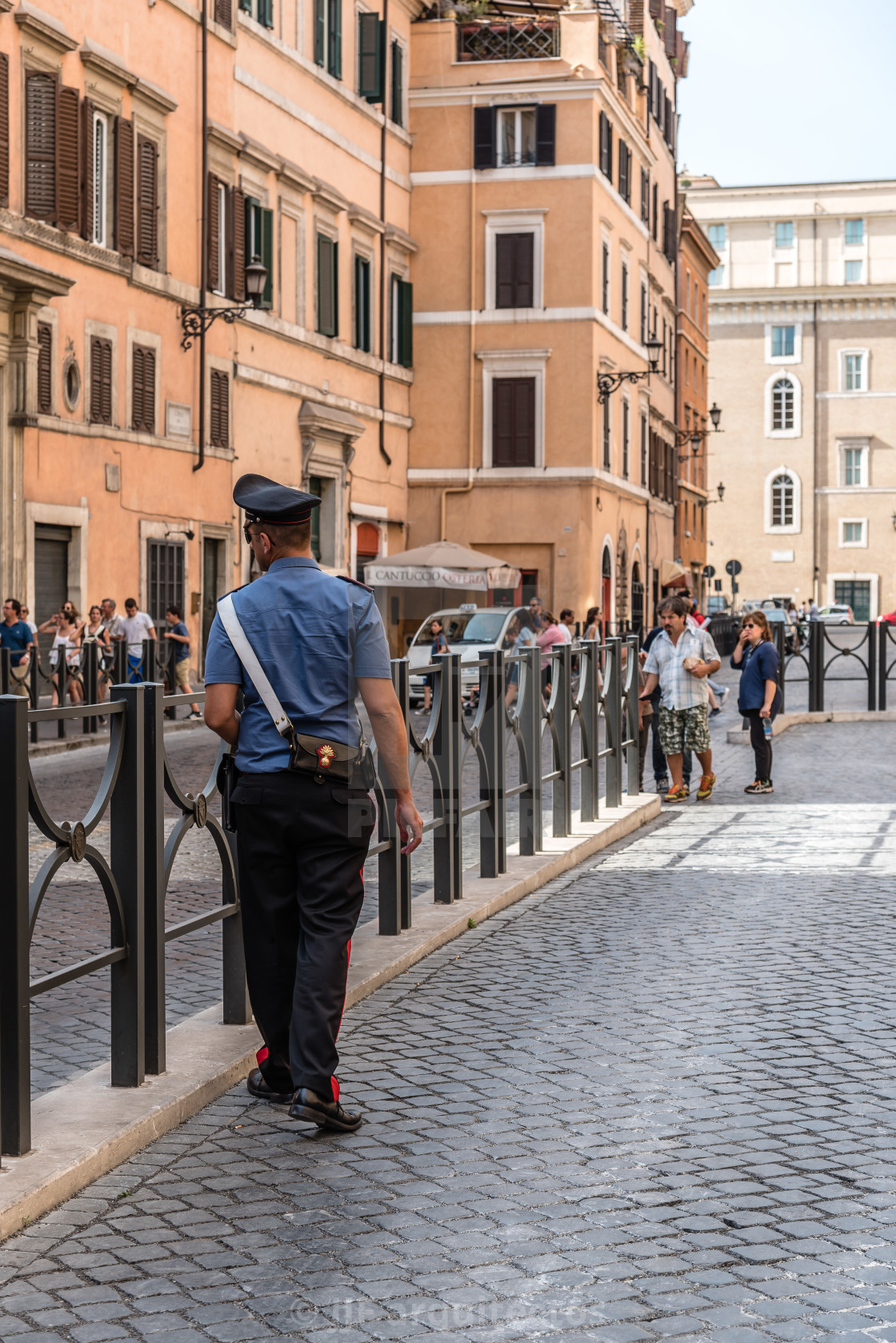 "Policeman and tourists in Rome" stock image