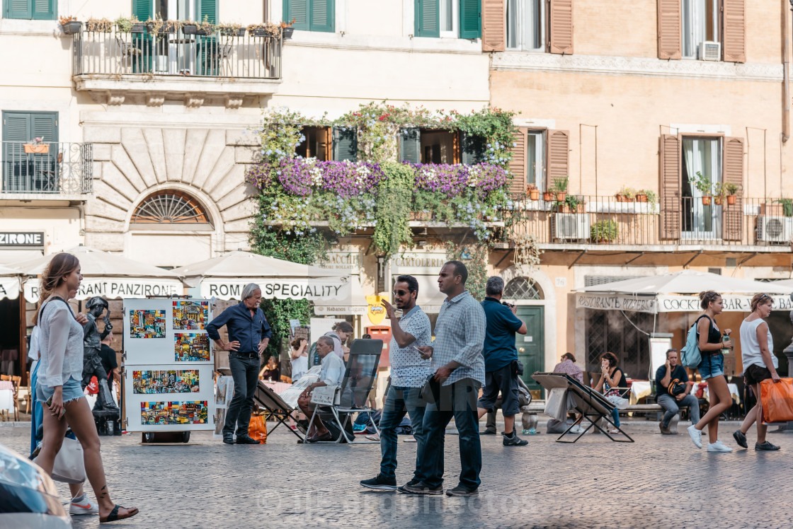 "Tourists in Navona Square in the historical centre of Rome." stock image