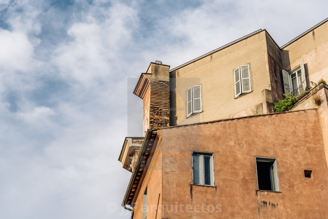 "Low angle view of old buildings in historical centre of Rome" stock image