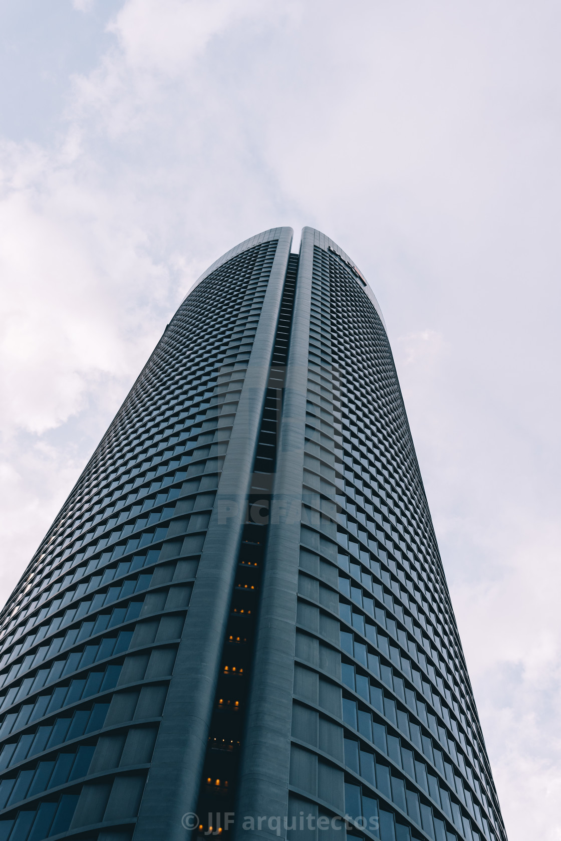 "Low angle view of skyscrapers in business district against sky" stock image