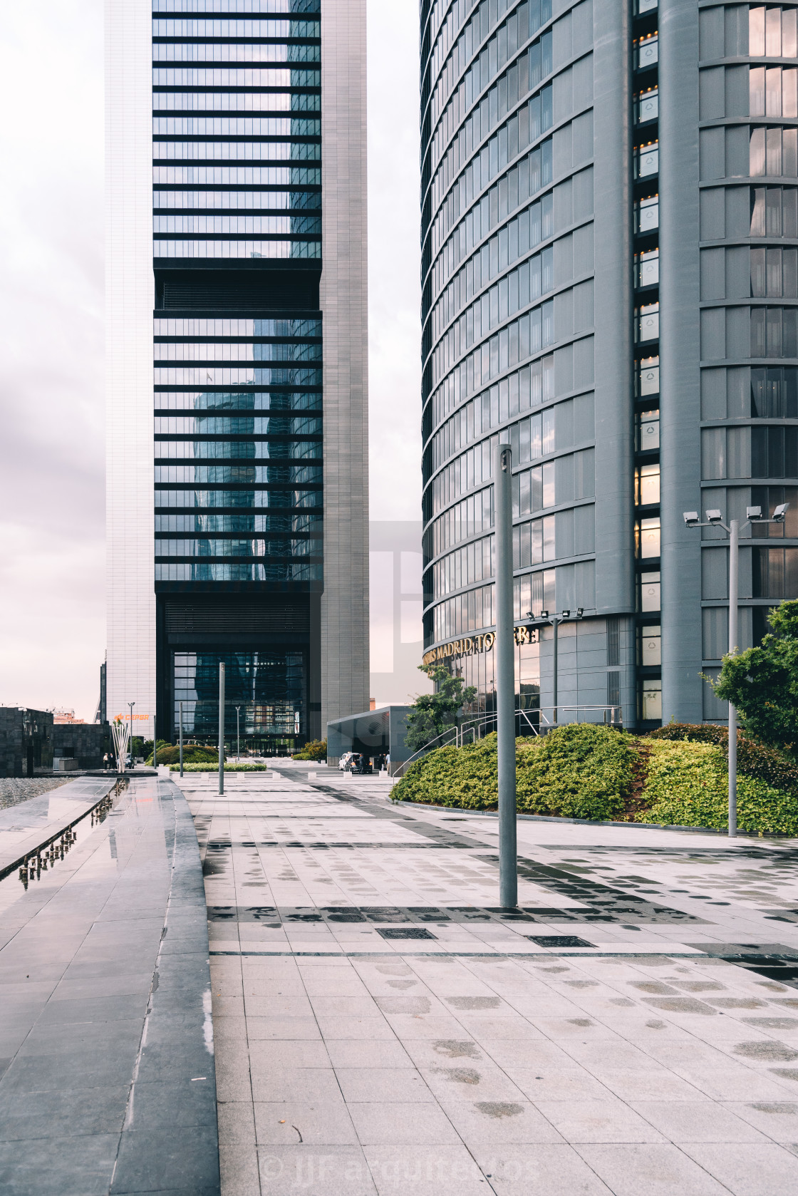 "View of skyscrapers in business district against sky" stock image