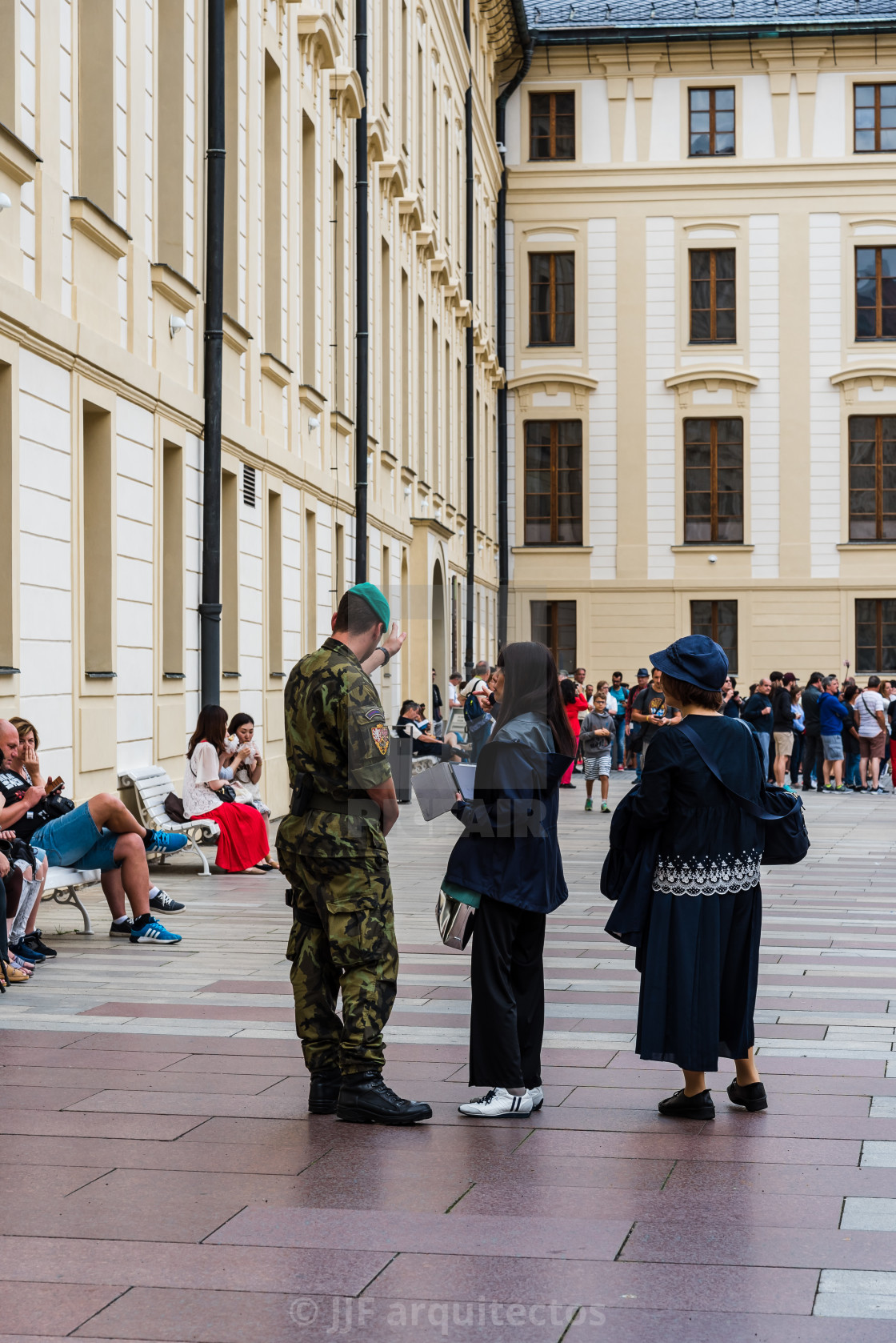 "Soldier and tourists in the Royal Palace of Prague" stock image