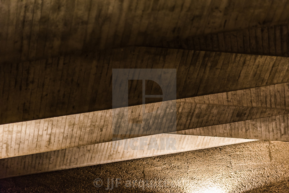 "Illuminated concrete ceiling. Old textured built structure" stock image