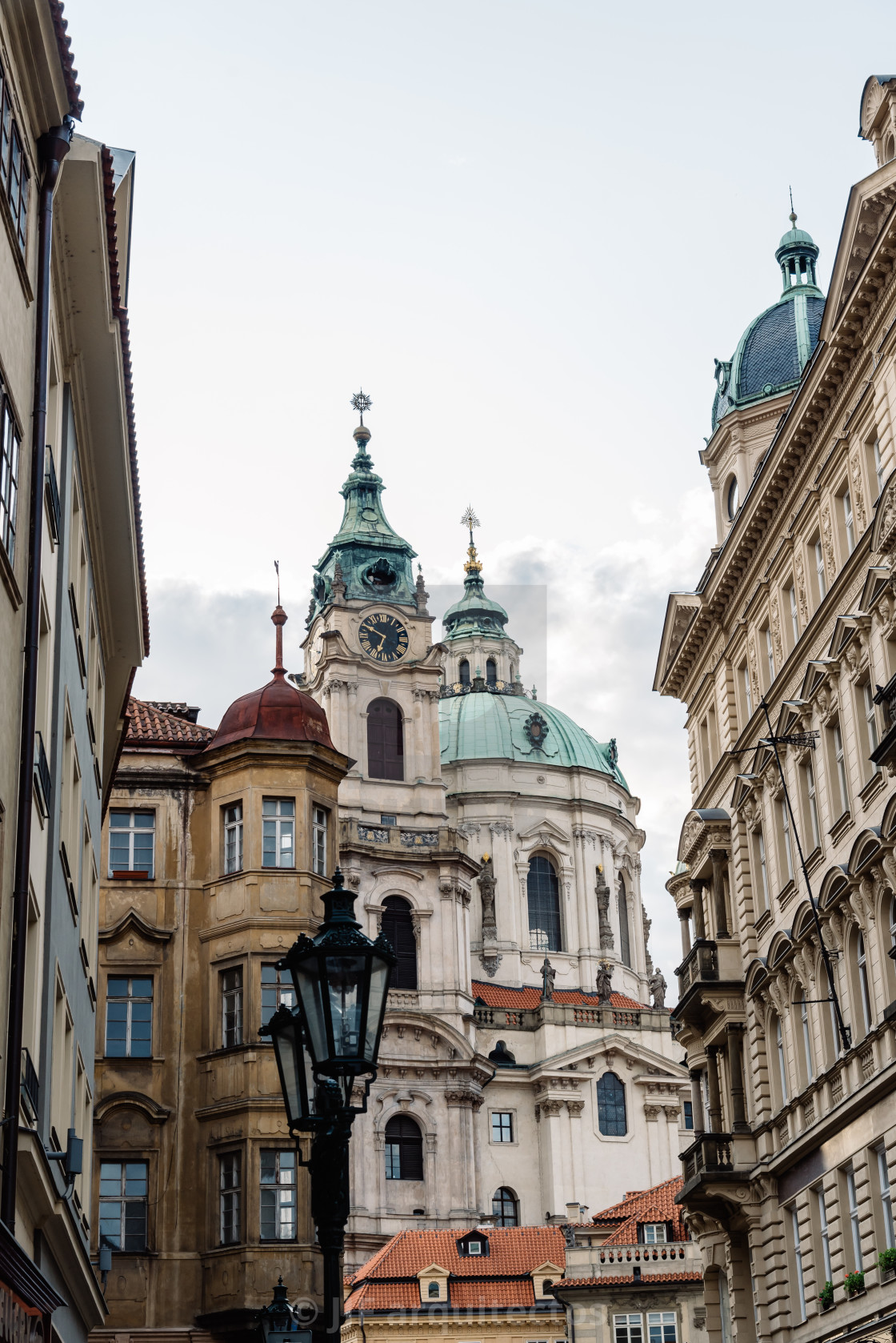 "Low angle view of St Nicholas Bell Tower in Prague" stock image