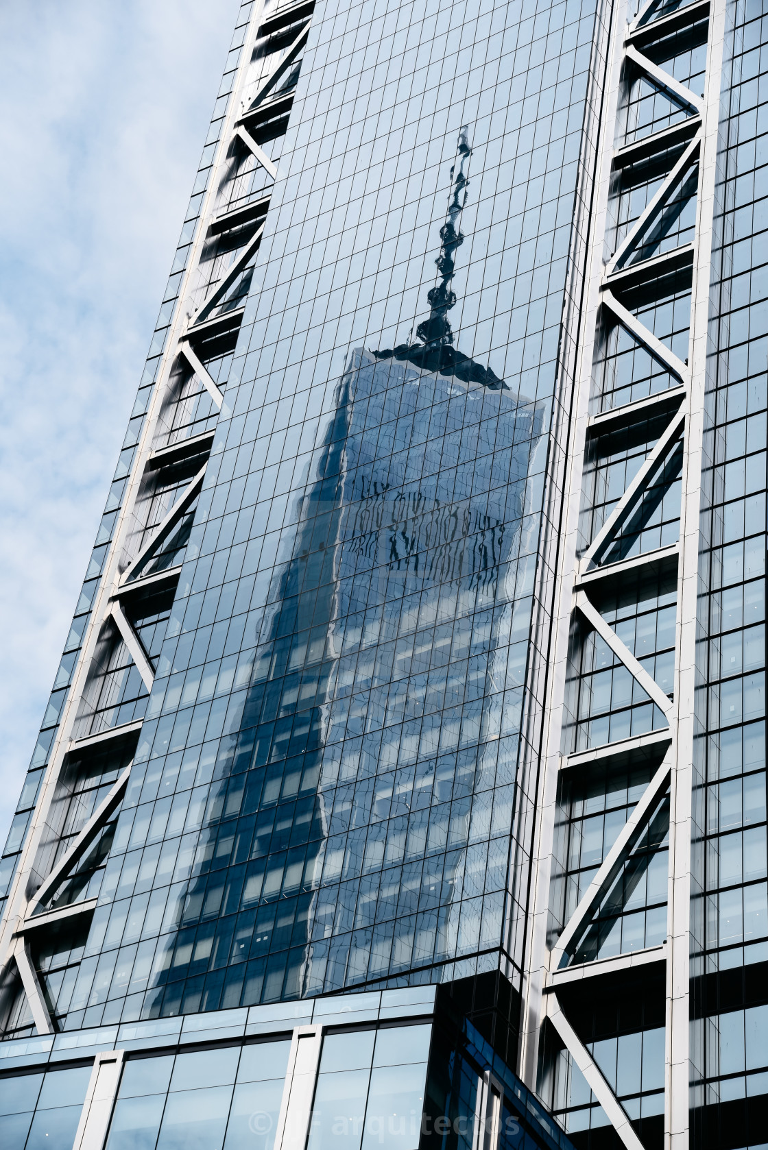 "One World Trade Center building reflected on glass facade" stock image