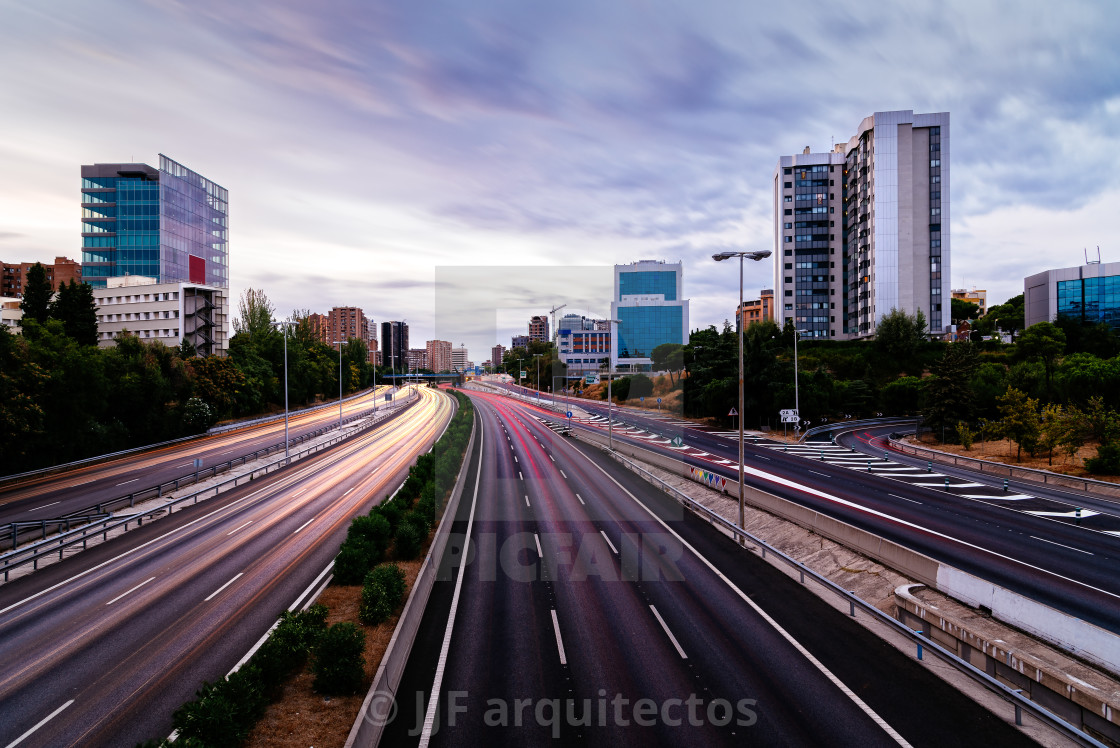 "M30 motorway in Madrid at sunset, long exposure" stock image