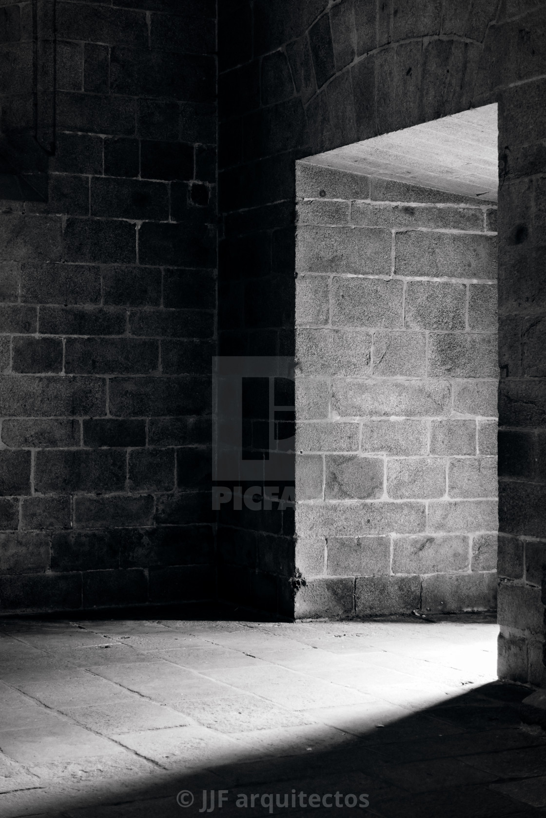 "Scary view of hollow on old stone wall in church" stock image