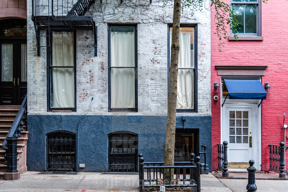 "Old Greenwich Village apartment buildings in New York" stock image