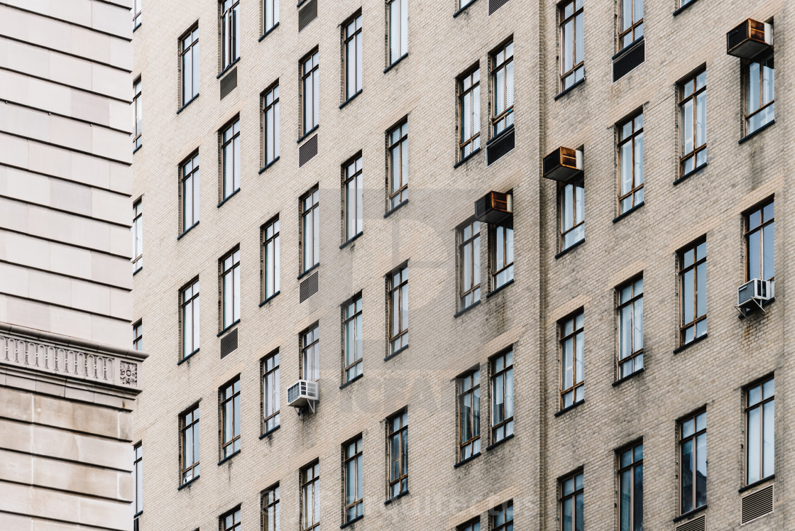 "Window pattern in facade of residential buildings" stock image