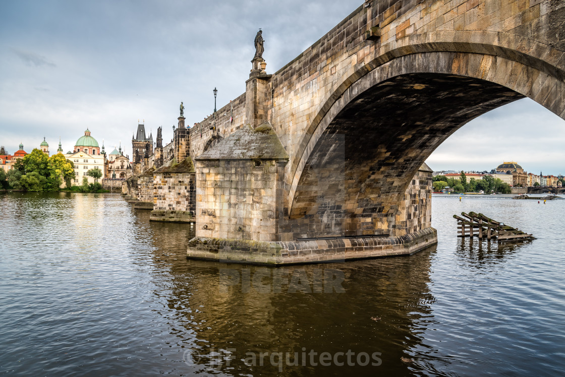 "Charles Bridge in Prague against sky at sunset" stock image