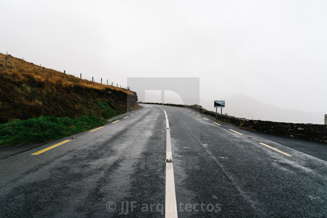 "Misty Lonely Road in Ireland" stock image