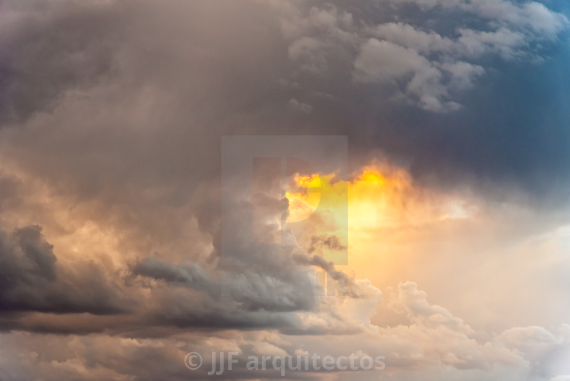 "Beautiful dramatic stormy clouds at sunset" stock image