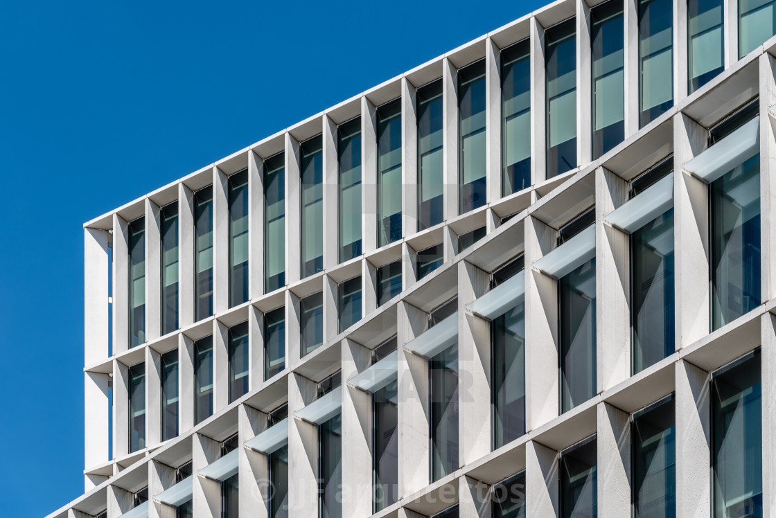 "Low angle view of the facade of modern office building" stock image