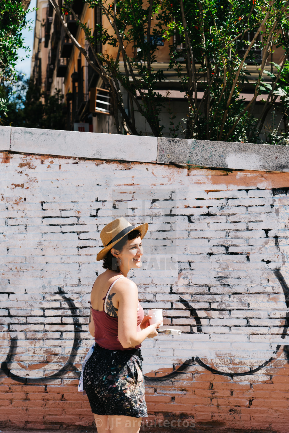 "Artist woman preparing paintings in Malasana district in Madrid" stock image