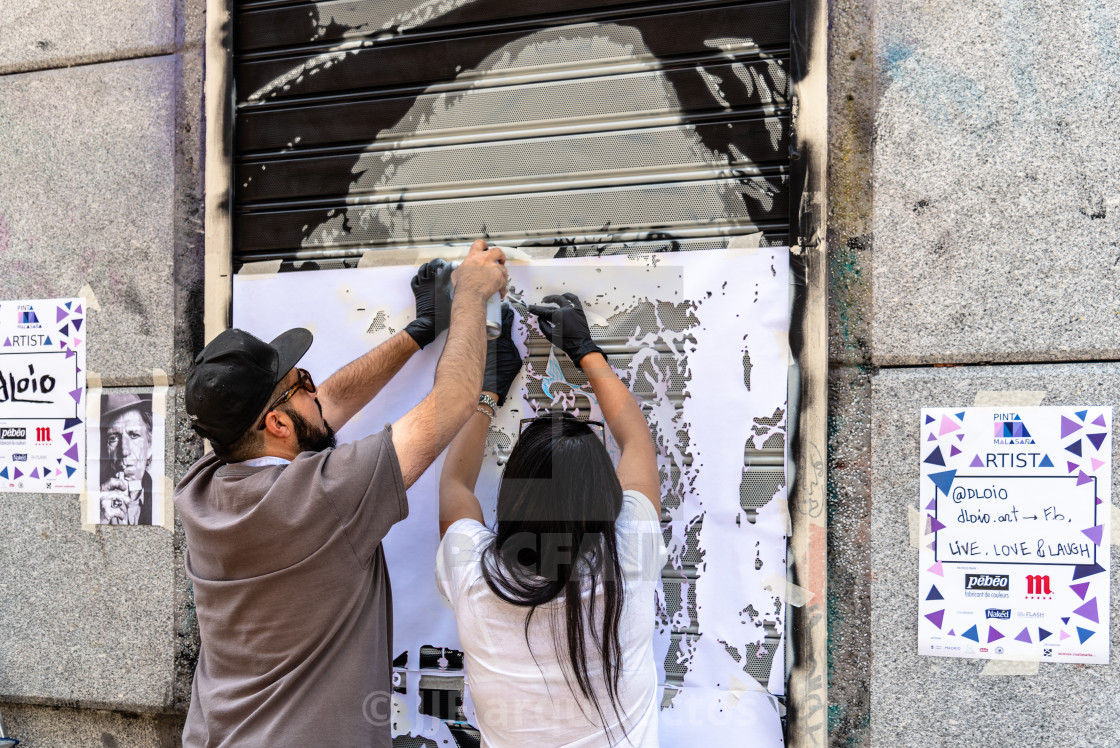 "Artists painting storefront in Malasana district in Madrid" by JJF arquitectos - $18.13 "Artists painting storefront in Malasana district in Madrid" stock image