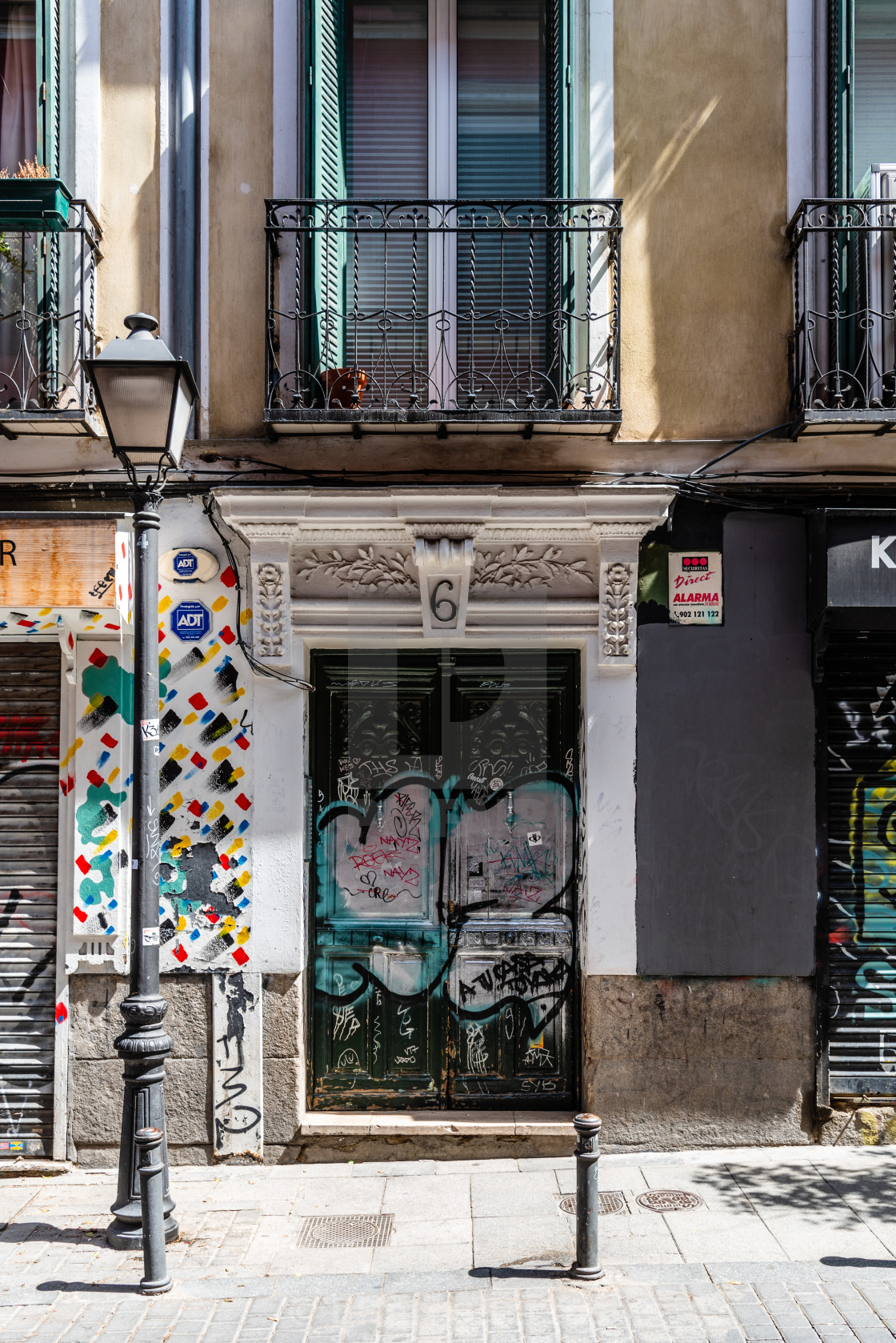 "Colorful storefront in Malasana district in Madrid" by JJF arquitectos - $18.09 "Colorful storefront in Malasana district in Madrid" stock image