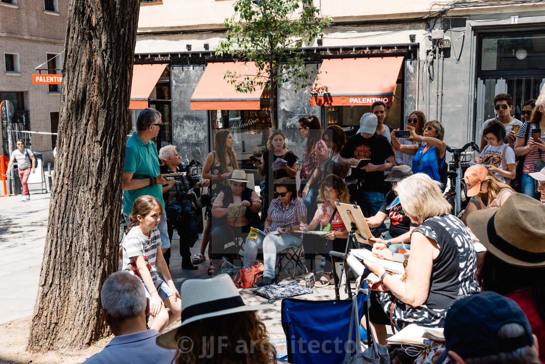 "People painting in the street in Malasana district in Madrid" stock image