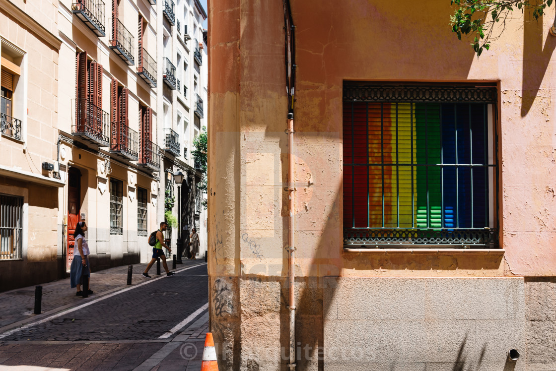 "Cityscape with gay rainbow flags on balconies in Madrid" stock image