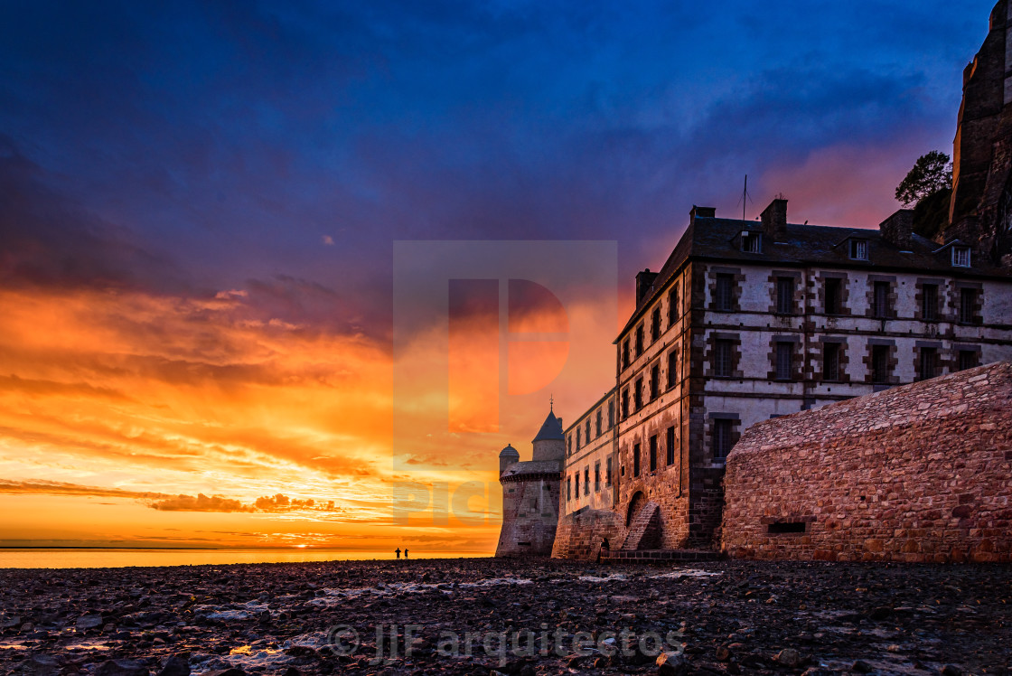 "Dramatic sunset on Mont Saint Michel, France" stock image